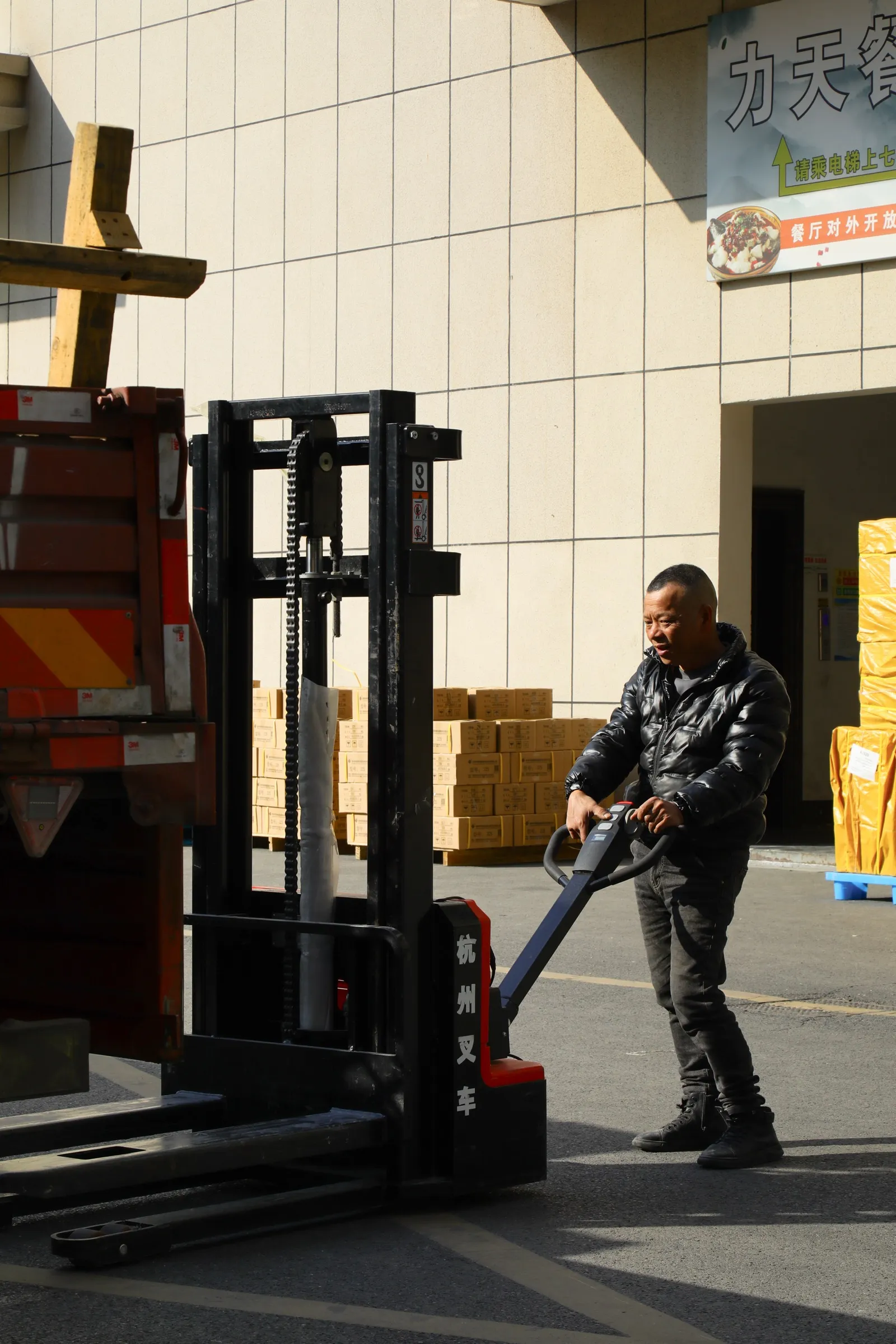 Forklift moving palletised cartons